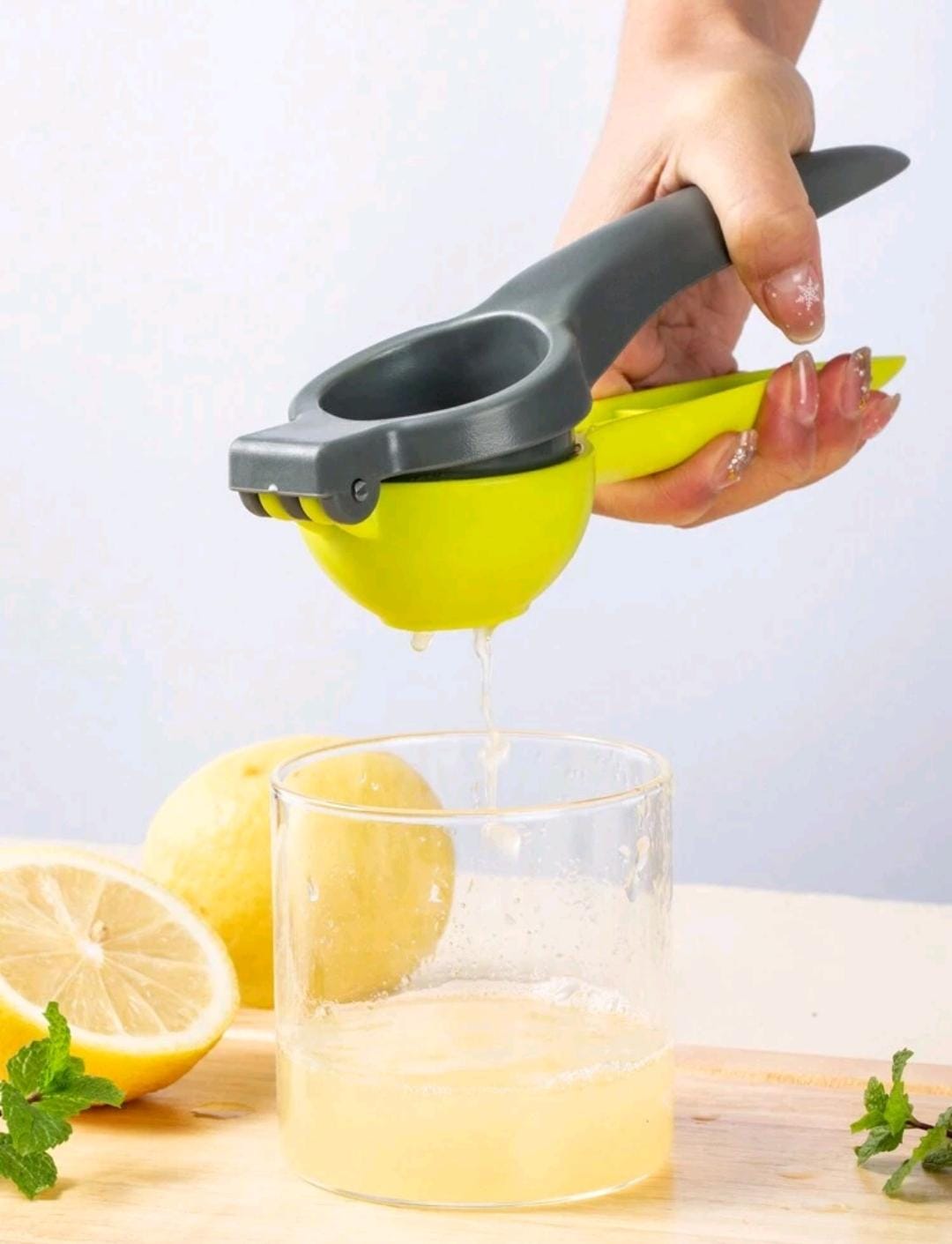 Hand held lemon squeezer hotsell